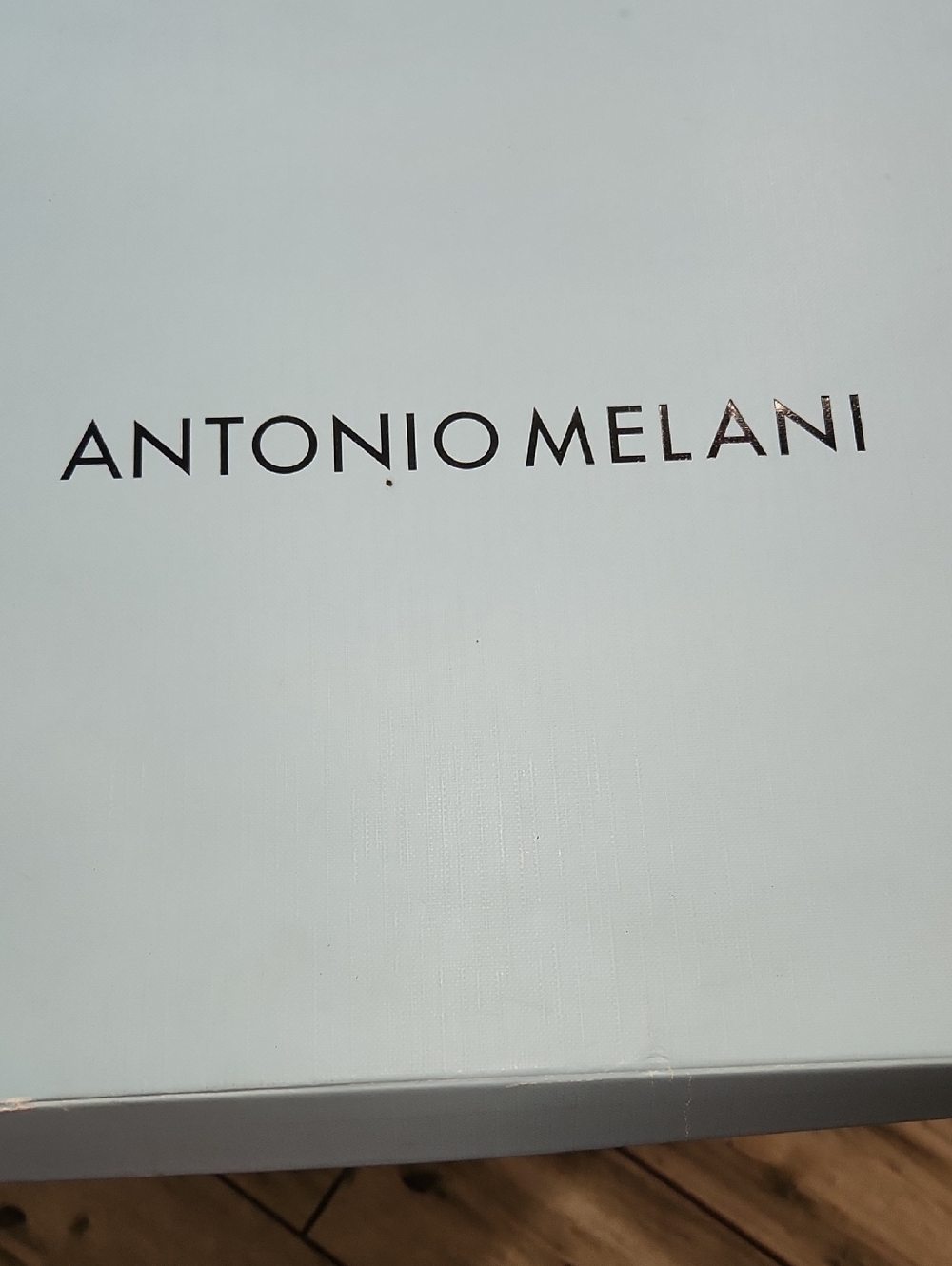 ANTONIO MELANI White Box with Black Logo